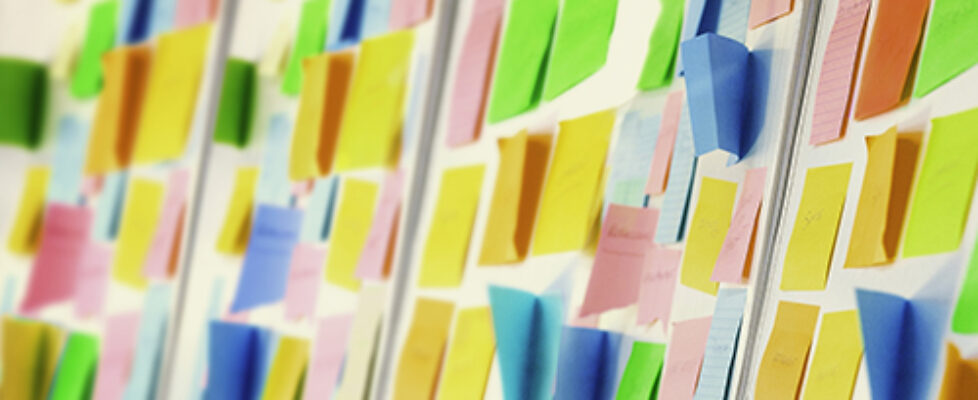 Wall covered with sticky notes