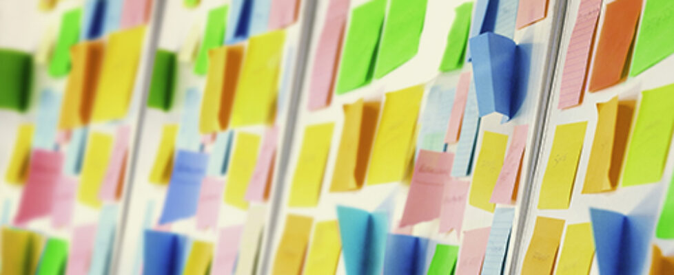 Wall covered with sticky notes